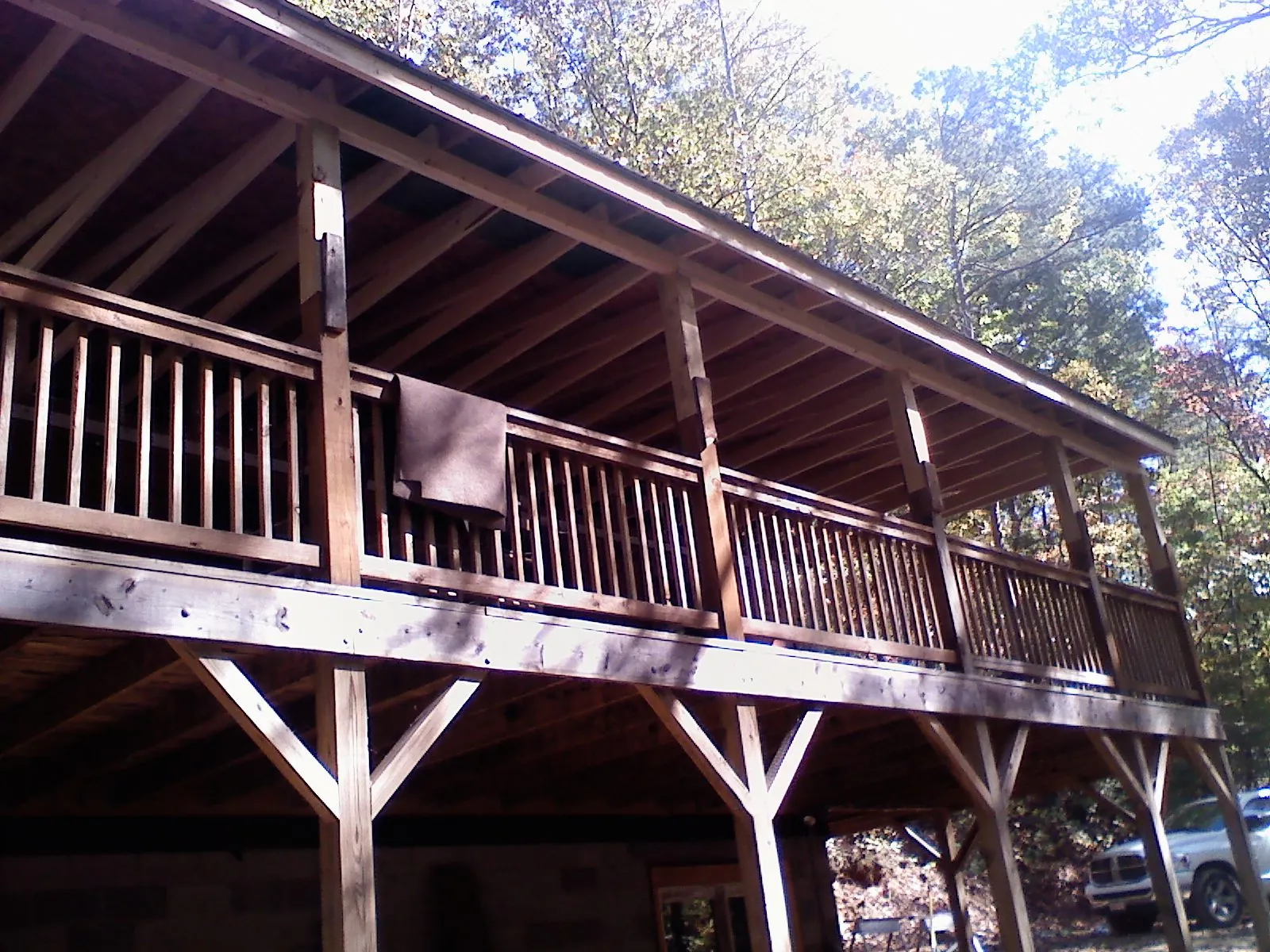 Timber framing under a new elevated porch and deck — Roof Leak Repair in Betterton by Roofing Brothers